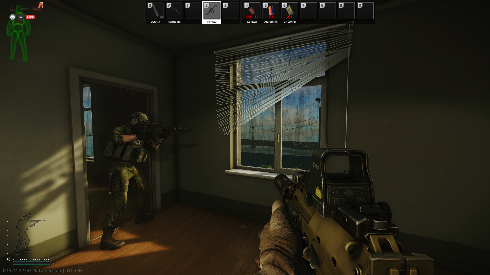 Player scavenging weapons from fallen enemy inside industrial warehouse in Escape from Tarkov 2