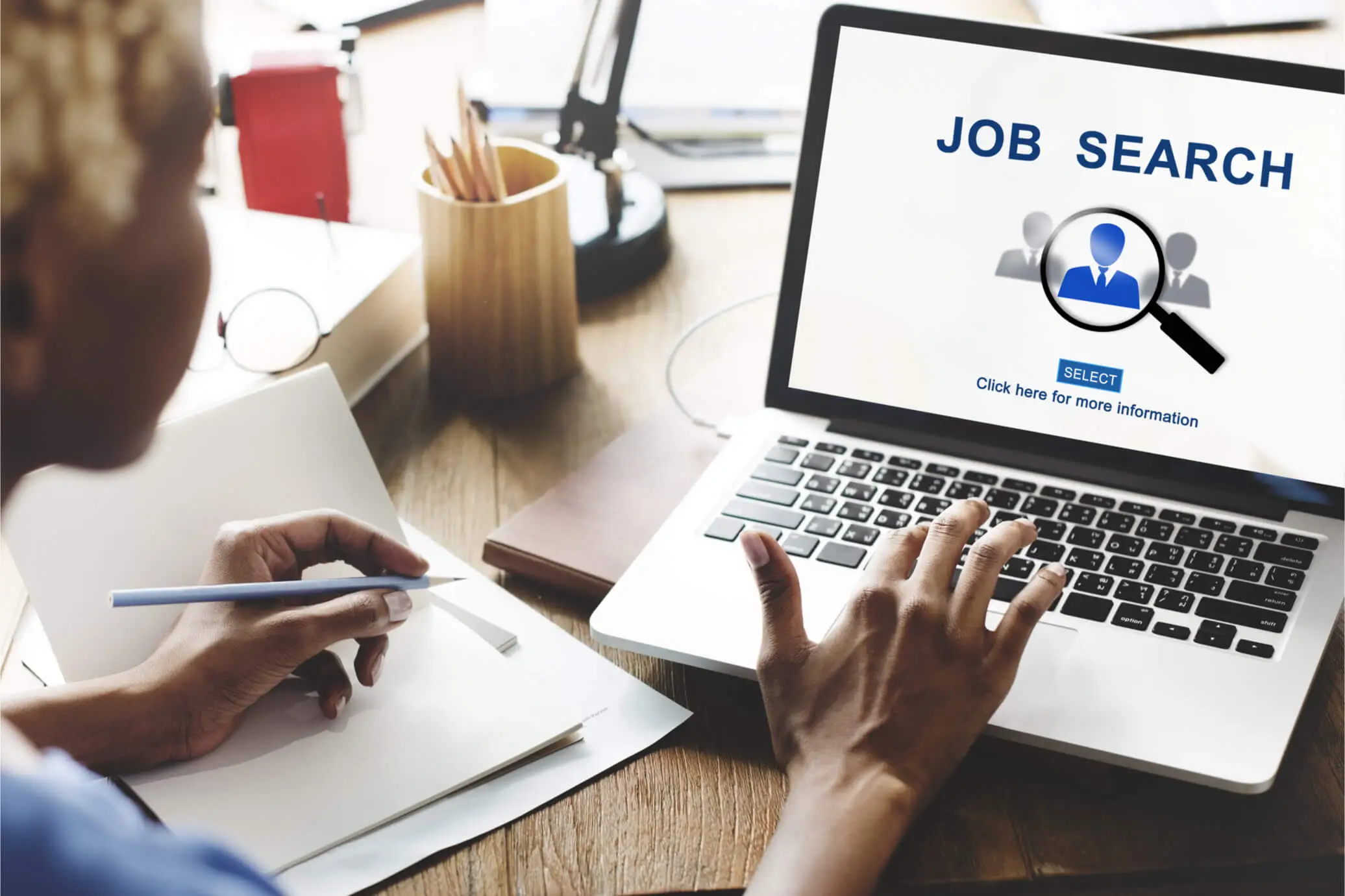 Overview of job search in Nigeria with laptop and job boards