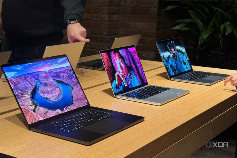 Apple MacBook lineup showing MacBook Air M4 and MacBook Pro M5 in retail display